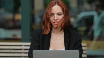 A Red Haired Business Woman Working Outdoors video