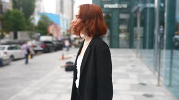 A Red Haired Business Woman Working Outdoors video