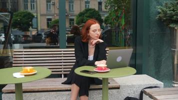 A Red Haired Business Woman Working Outdoors video