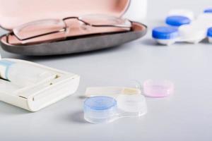 Travel set for storage of contact lenses alternative for glasses. Choice of vision correction photo