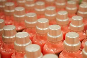 detergent bottles, focus on the cap photo