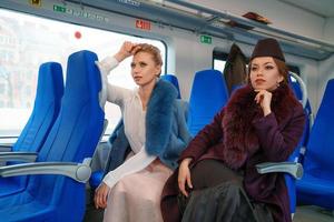 Two female friends on the train photo