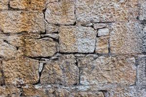 Background of natural old stone brick of an old castle, hedge. photo