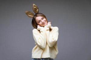 Portrait of a cute girl in rabbit ears photo