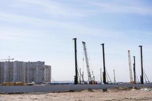 high-rise buildings under construction with photo
