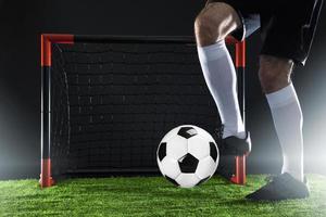 Football. Soccer. Soccer player dribbling with ball photo