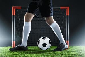 Football. Soccer. Soccer player dribbling with ball photo