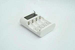 Battery Charger with four slots on a white background photo