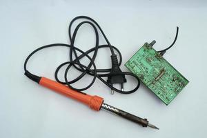 Electric soldering iron with white Bacground photo