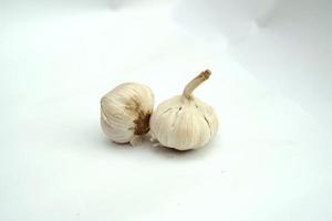 Garlic clove and bulb isolated on white background photo