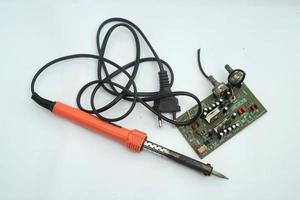 Electric soldering iron with white Bacground photo