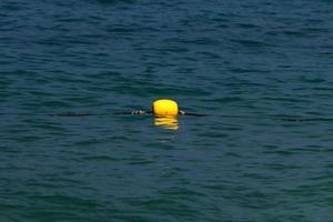 The color of the water in the mediterranean sea in shallow water photo