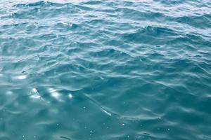 The color of the water in the mediterranean sea in shallow water photo