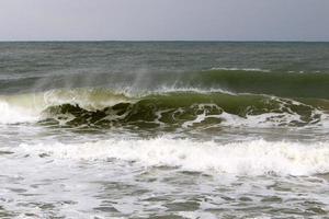 The color of the water in the mediterranean sea in shallow water photo