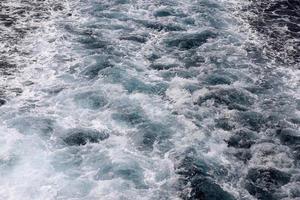 The color of the water in the mediterranean sea in shallow water photo