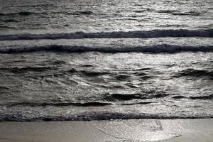 The color of the water in the mediterranean sea in shallow water photo