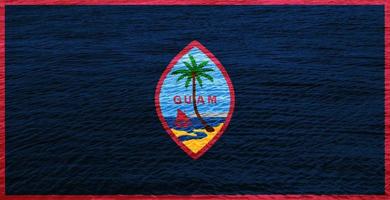Flag of the territory of Guam on the texture. photo