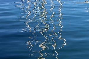 The color of the water in the mediterranean sea in shallow water photo