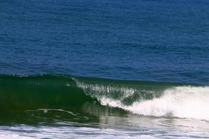 The color of the water in the mediterranean sea in shallow water photo