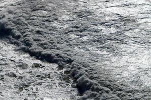 The color of the water in the mediterranean sea in shallow water photo