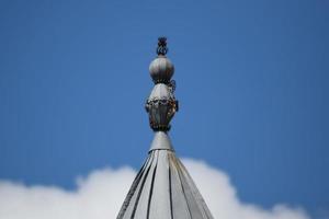 Steel designs on  spire of the tower photo