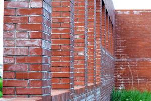 Abandoned building of red brick photo