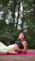 Woman practicing Yoga in the nature video