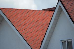 Decorative metal tile on a roof photo