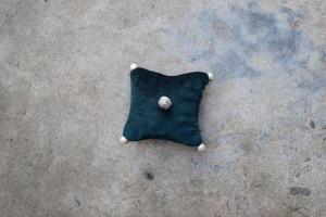 The pad on the background of concrete photo