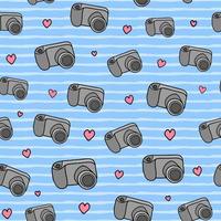 Seamless pattern with cameras and hearts. vector