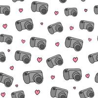 Seamless pattern with cameras and hearts. vector