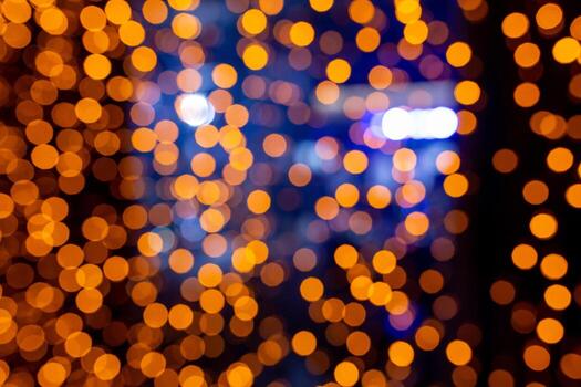 Abstract circular bokeh background of Christmaslight. bokeh from garlands. background for screensaver. Defocused lights. Blurred bokeh with yellow color lights. photo