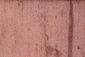 Detailed view on aged concrete walls with cracks and a lot of structure in high resolution photo