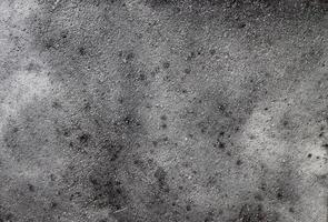 Detailed view on aged concrete walls with cracks and a lot of structure in high resolution photo