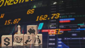 The chess and business icon on wood cube  3d rendering photo