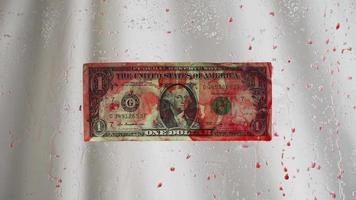 Blood money. The banknote face value 1 dollar. The theme of hired murder and corruption. Behind clear glass covered with red drops video