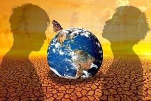 changing the environment globe on a barren land photo