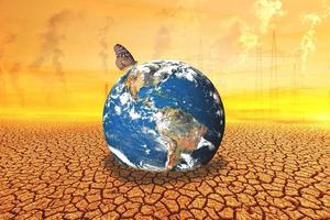 changing the environment globe on a barren land photo