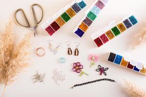 Accessories for beading - beads, wire and fittings. Needlework and handmade. Top view photo