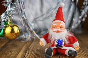 Santa Claus on wooden background beautiful bokeh photo