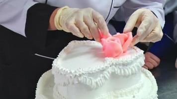 Closeup of cook hands making sweet figurines video