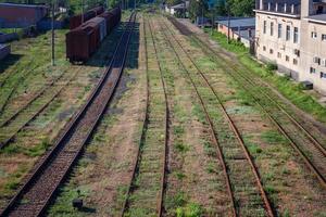 railway tracks, a lot of rails go into the distance photo