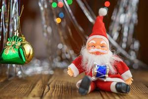 Santa Claus on wooden background beautiful bokeh photo