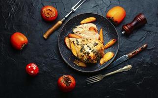 Chicken meat fried with persimmon photo