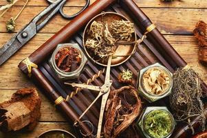 Tray with healing herbs. photo