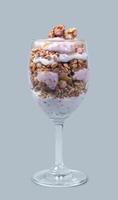 homemade ice cream nut and strawberry in transparent glass front view photo