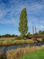 teh city of Schuettorf at the Vechte River in germany photo