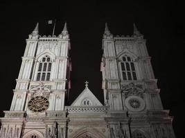 Westminster Abbey church at night in London photo