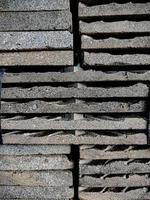 abstract background of square stone stacked upwards.is a natural rock for development materials photo