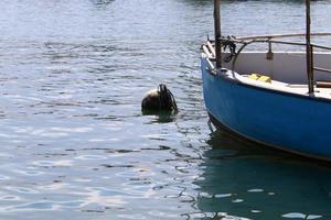 Berth on the shore for mooring boats and yachts. photo